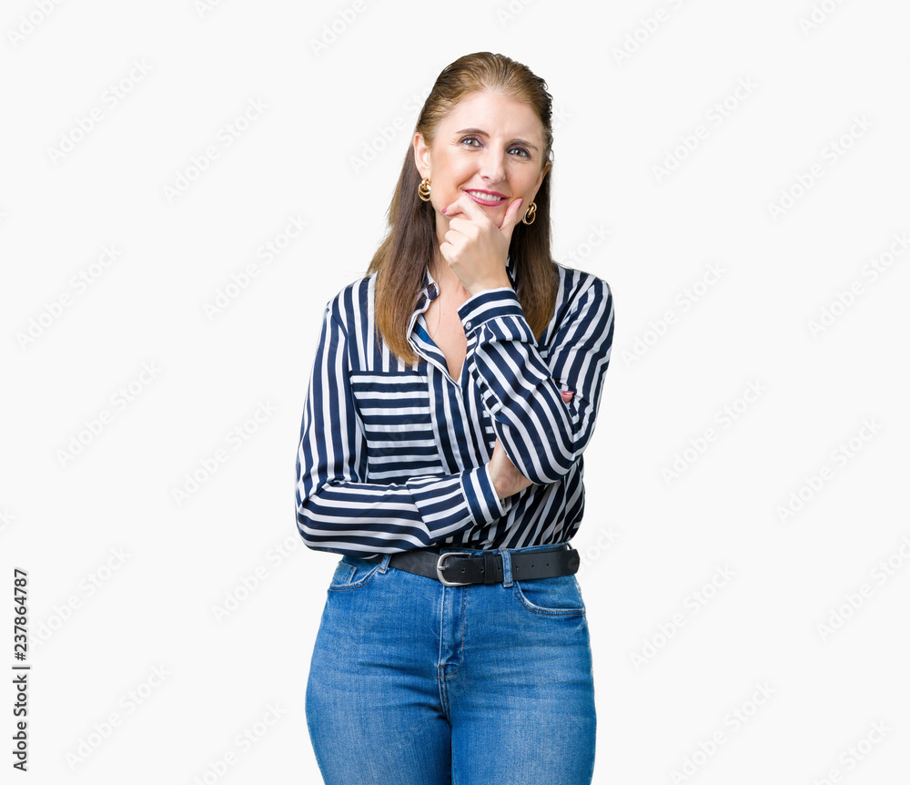 Middle age mature business woman over isolated background looking confident at the camera with smile with crossed arms and hand raised on chin. Thinking positive. Middle age mature business woman over isolated background looking confident at the camera with smile with crossed arms and hand raised on chin. Thinking positive.