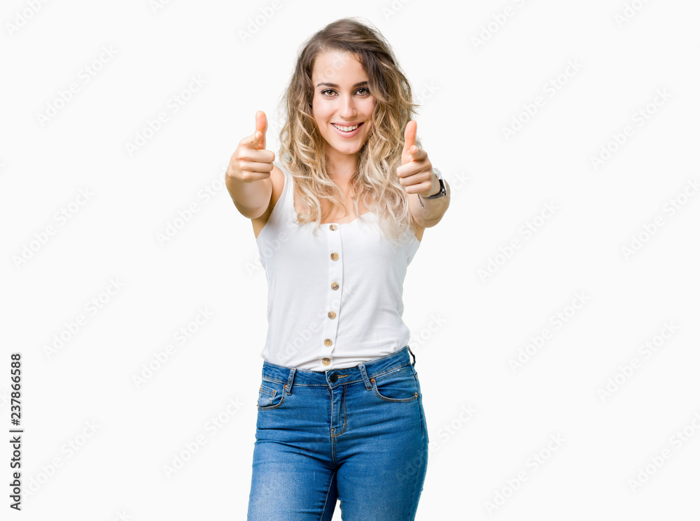 Beautiful young blonde woman over isolated background Pointing to you and the camera with fingers, smiling positive and cheerful Beautiful young blonde woman over isolated background Pointing to you and the camera with fingers, smiling positive and cheerful