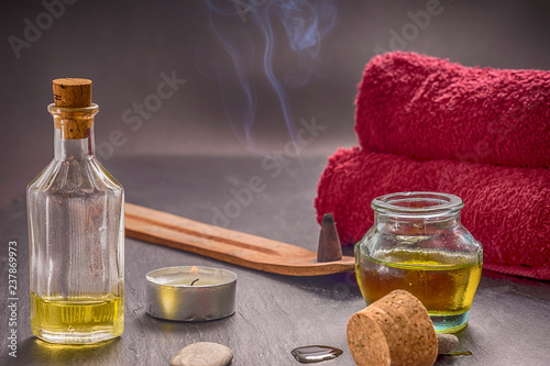 Photography zen basalt stones and aroma oil on the stone background