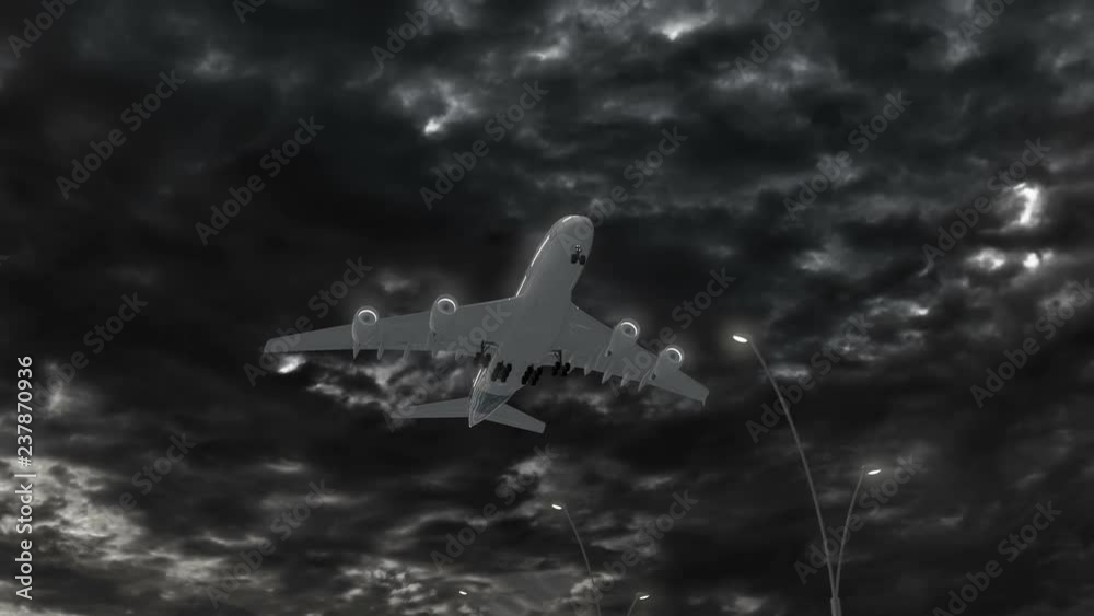 Papua New Guinea, approach of the aircraft to land at night in cloudy weather, flying over the name of the country and its flag