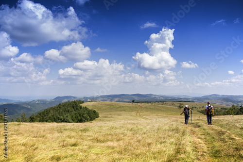 Hikers at the mountain in sunny weather © Petar