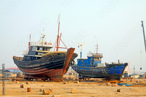 fishing boats waiting for repair