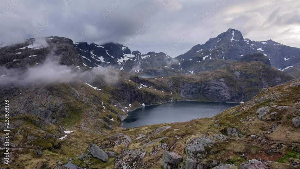 Lakes Tennesvatnet and Krokvatnet and surrounding mountaintops on the Lofoten islands, Norway. Lakes Tennesvatnet and Krokvatnet and surrounding mountaintops on the Lofoten islands, Norway.
