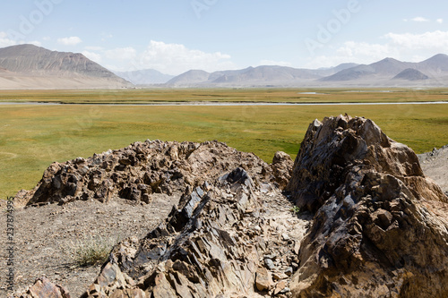 Landscape in the Pamir mountains in the area of Murghab in Tajikistan photo