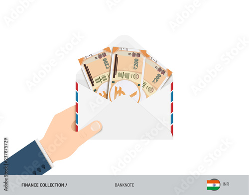 200 Indian Rupee Banknotes in envelope hold in hand. Flat style opened white envelope with cash. Salary payout or corruption concept.