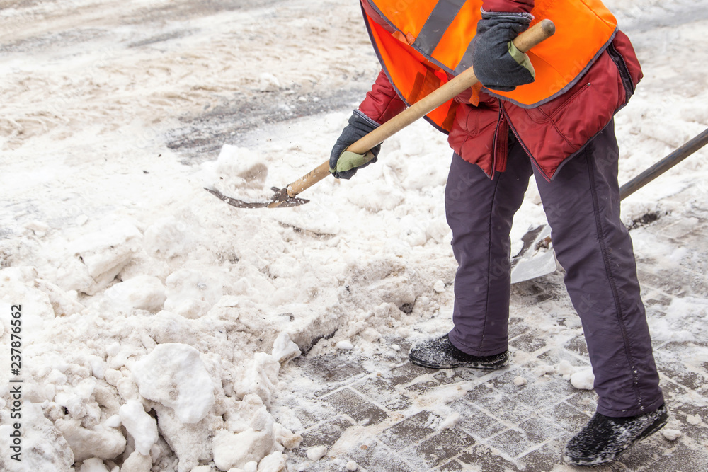 People shoveling snow. Snow clearance after a heavy snowfall People shoveling snow. Snow clearance after a heavy snowfall