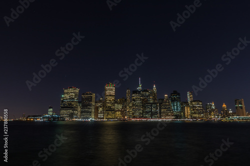 Manhattan skyline panorama with Times Square lights at dusk, New York City