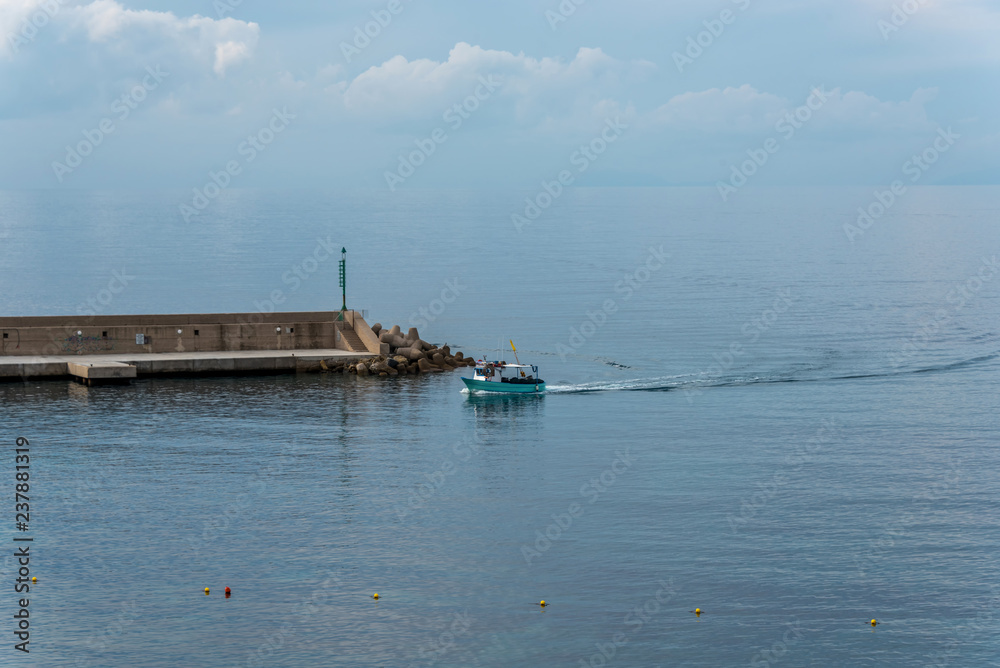 Fishing Boat Returning to Port in Southern Italy on the Mediterranean Sea