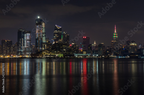 Manhattan skyline panorama with Times Square lights at dusk  New York City