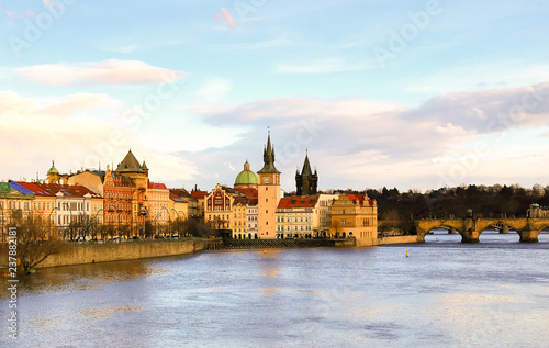 panoramic view of the tower with a clock on the river vatslav mala strana part of the stone bridge. Prague Czech Republic March 2017