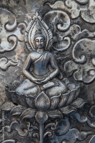 Thai style silver carving art on temple wall , Wat Srisuphan ,Chiang Mai, Thailand.