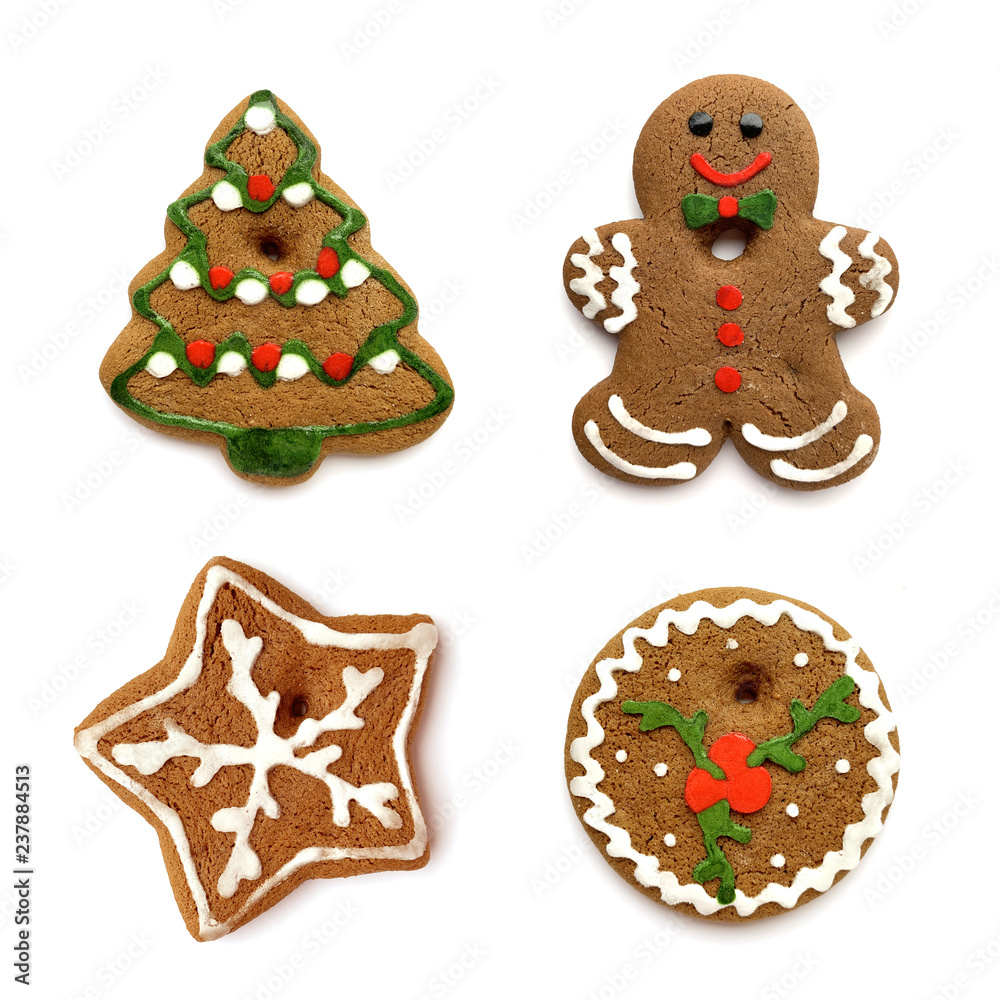 Christmas cookies. Set of traditional cookies sweet and cute Christmas tree decoration isolated on white background. Holiday cookie in shape of Christmas tree, star, gingerbread men and snowflake. Christmas cookies. Set of traditional cookies sweet and cute Christmas tree decoration isolated on white background. Holiday cookie in shape of Christmas tree, star, gingerbread men and snowflake.