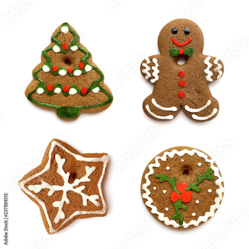 Christmas cookies. Set of traditional cookies sweet and cute Christmas tree decoration isolated on white background. Holiday cookie in shape of Christmas tree, star, gingerbread men and snowflake.