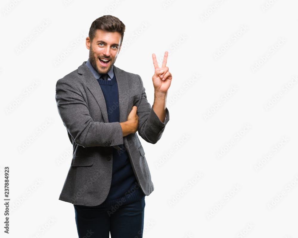 Young handsome business man over isolated background smiling with happy face winking at the camera doing victory sign. Number two. Young handsome business man over isolated background smiling with happy face winking at the camera doing victory sign. Number two.