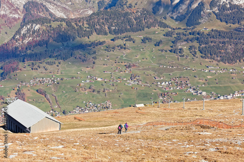 Tourists descending to Wildhauspass valley from Churfirsten photo