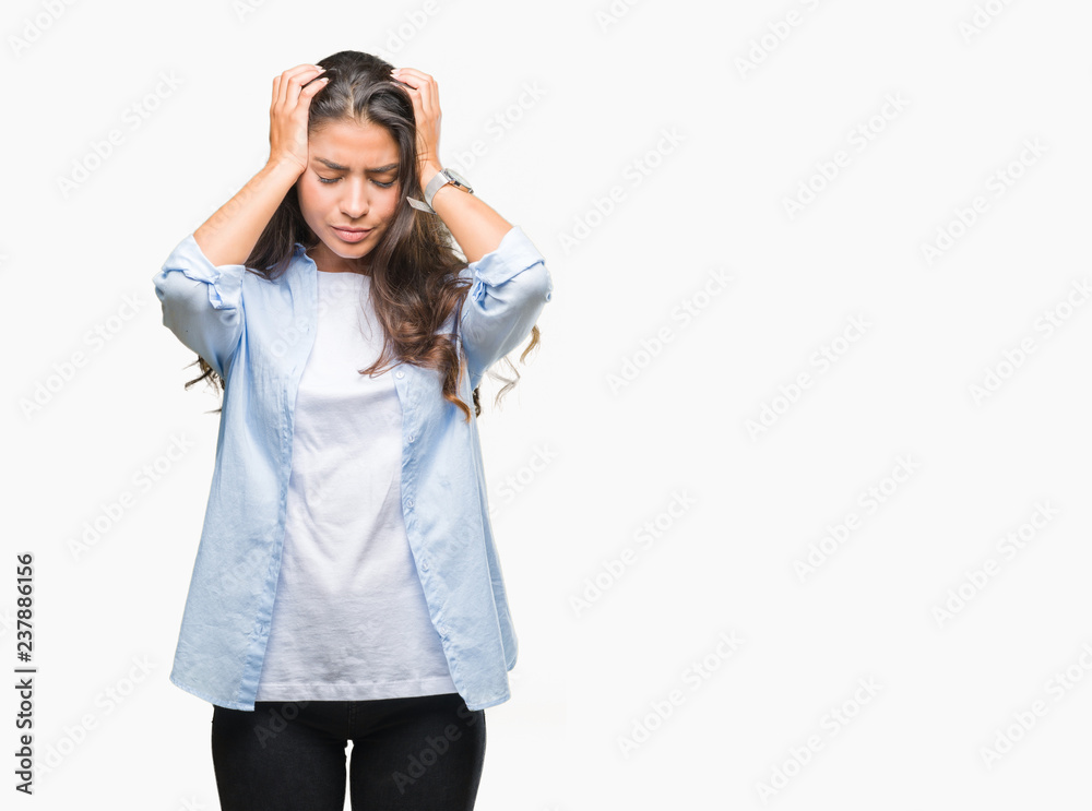 Young beautiful arab woman over isolated background suffering from headache desperate and stressed because pain and migraine. Hands on head. Young beautiful arab woman over isolated background suffering from headache desperate and stressed because pain and migraine. Hands on head.