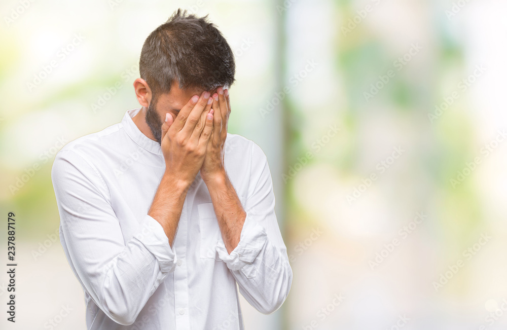 Adult hispanic man over isolated background with sad expression covering face with hands while crying. Depression concept. Adult hispanic man over isolated background with sad expression covering face with hands while crying. Depression concept.
