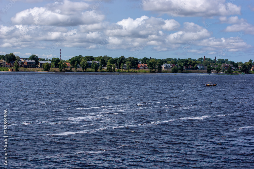 Obraz premium Riga city, capital of Latvia panoramic view with river Daugava and cable bridge