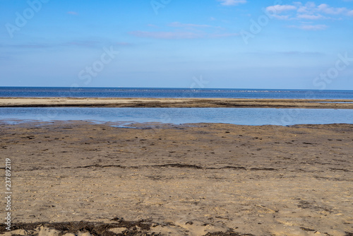 empty sea beach with sand dunes