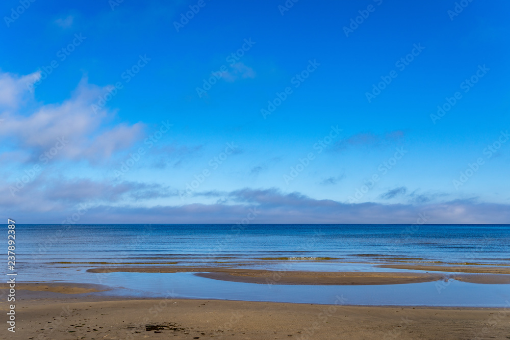 empty sea beach with sand dunes