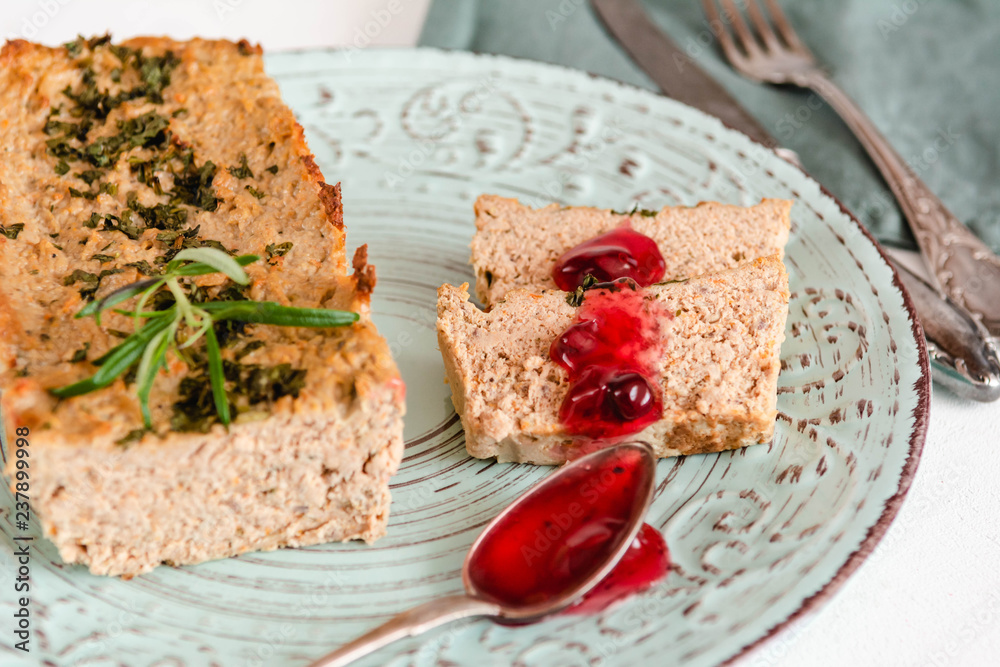 Chicken and liver pate with cranberry sauce, served on plate. Chicken and liver pate with cranberry sauce, served on plate.