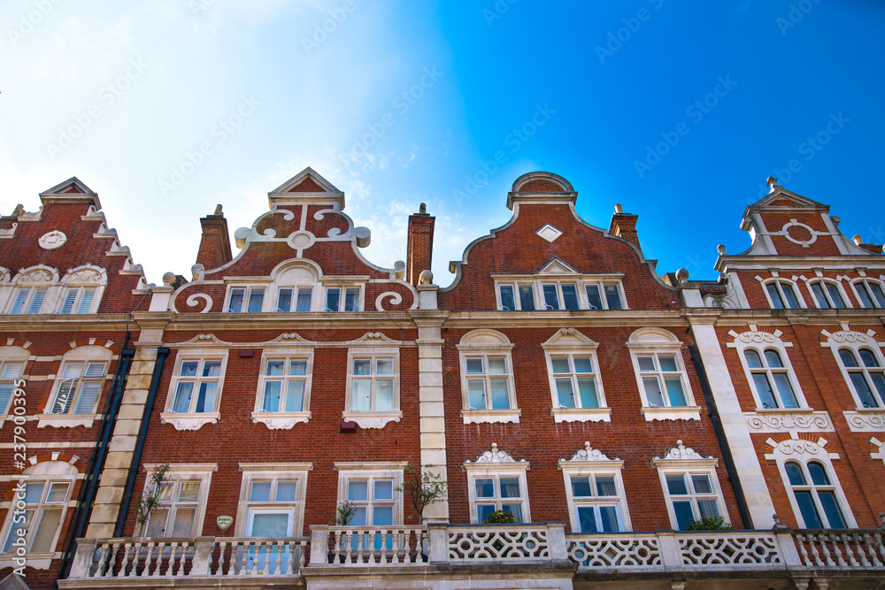 Fototapeta premium London, UK. Residential area of Kensington and Chelsea. Row of periodic buildings. 
