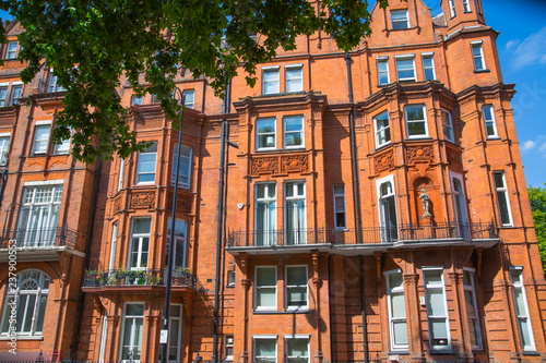 London  UK. Residential area of Kensington and Chelsea. Row of periodic buildings. 