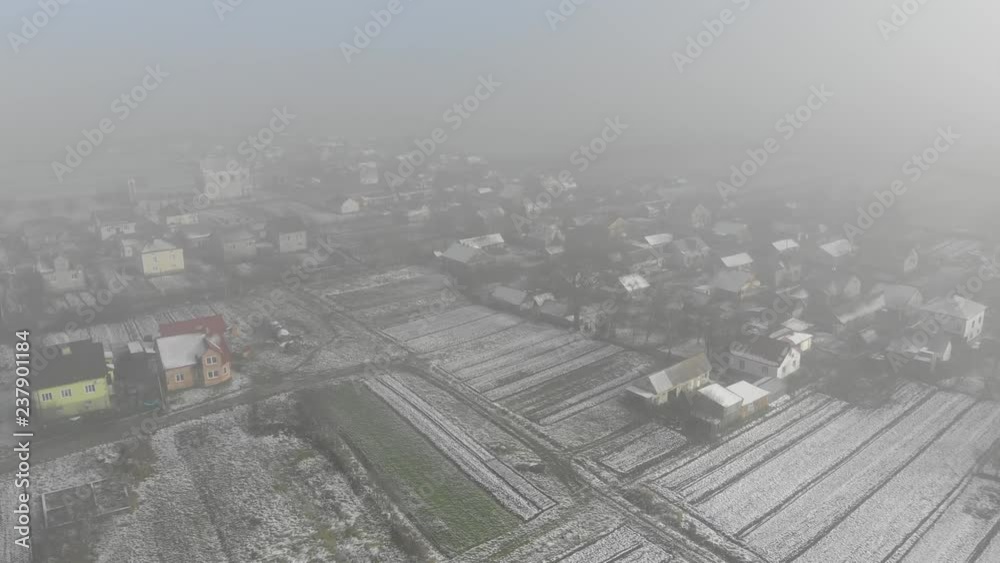 Aerial view of Ukrainian village. Winter time. Fly forward technique Aerial view of Ukrainian village. Winter time. Fly forward technique