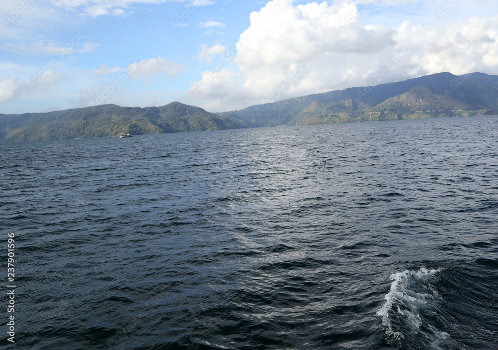 Indonesia, Sumatra island, lake Toba. Ferry across the lake to Samosir island Indonesia, Sumatra island, lake Toba. Ferry across the lake to Samosir island