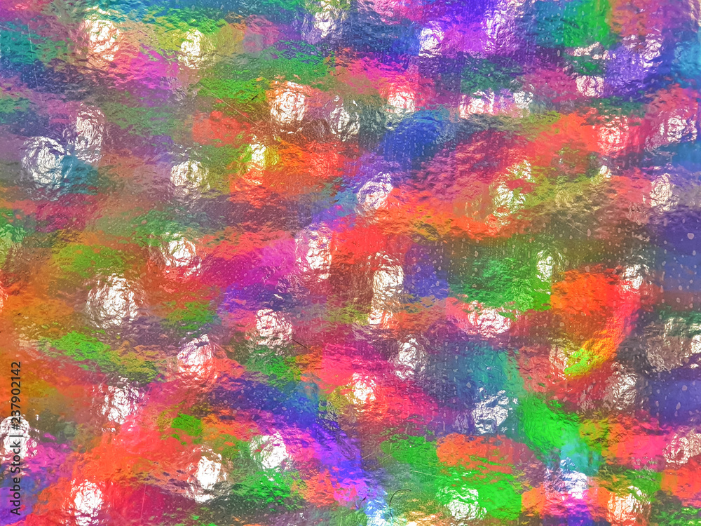 paper reflects rainbow colors.abstract shiny dot background