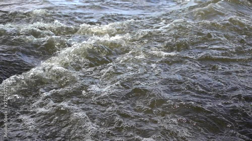 Strong water stream at the river rapids, closeup, slow motion 240 fps. Full HD stock video footage Strong water stream at the river rapids, closeup, slow motion 240 fps. Full HD stock video footage