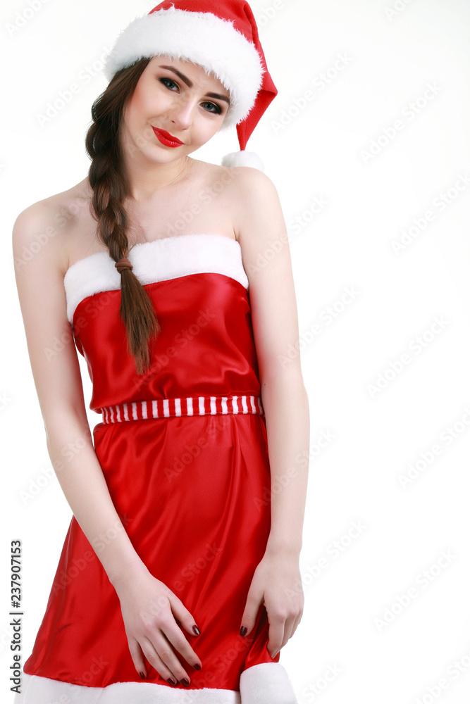 Beautiful smiling female model wear santa hat Beautiful smiling female model wear santa hat
