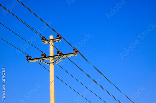 telegraph poles in the blue sky background