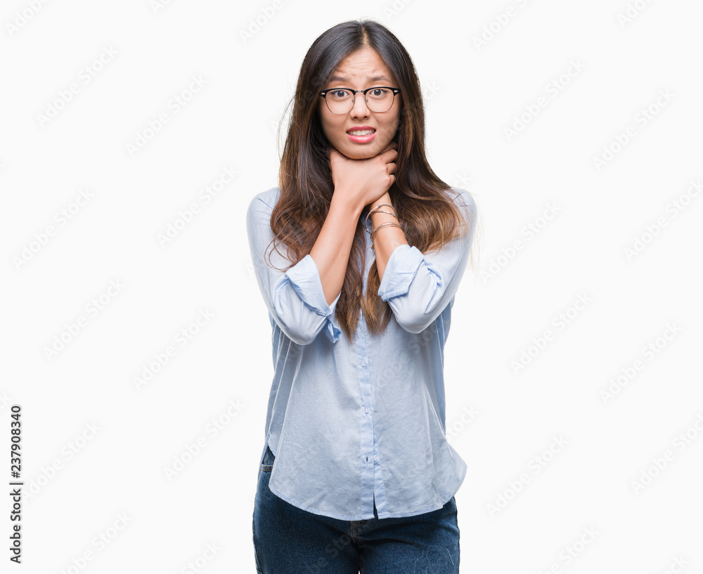 Young asian business woman wearing glasses over isolated background shouting and suffocate because painful strangle. Health problem. Asphyxiate and suicide concept. Young asian business woman wearing glasses over isolated background shouting and suffocate because painful strangle. Health problem. Asphyxiate and suicide concept.