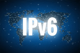 White glowing text IPv6 on world map blue background.
