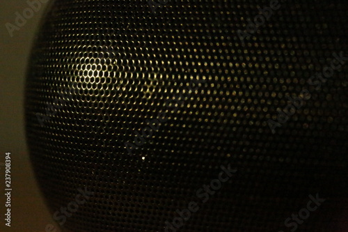 speaker on black background