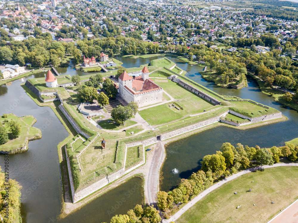 Fortifications of Kuressaare episcopal castle (star fort, bastion fortress) built by Teutonic Order, Saaremaa island, western Estonia, aerial view.