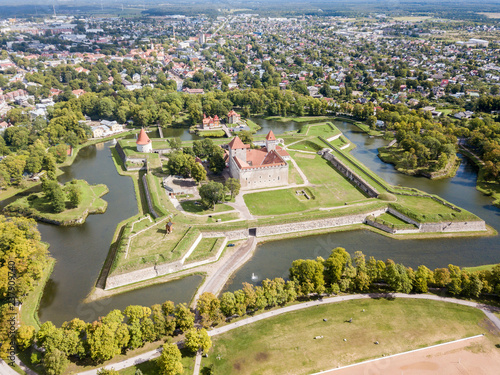 Fortifications of Kuressaare episcopal castle (star fort, bastion fortress) built by Teutonic Order, Saaremaa island, western Estonia, aerial view. photo