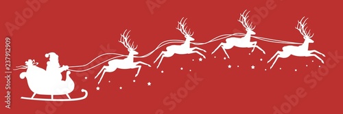 Санта клаус летит с подарками на санях