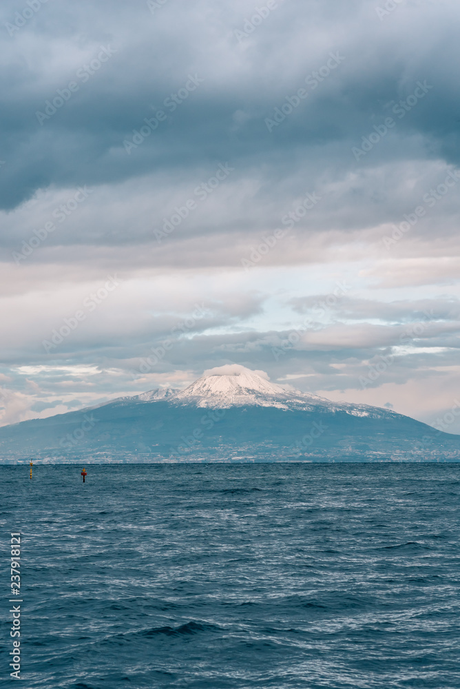 Mount Vesuvius covered in snow, seen from Sorrento, Italy