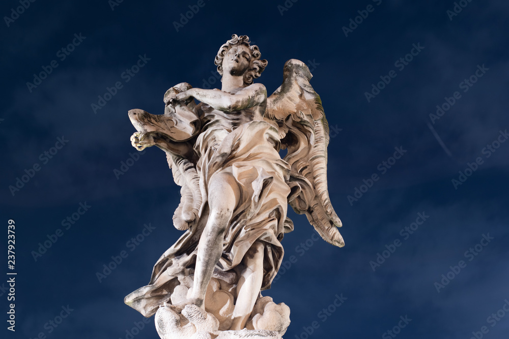 Obraz premium Statue On Bridge Ponte Sant'Angelo Called 