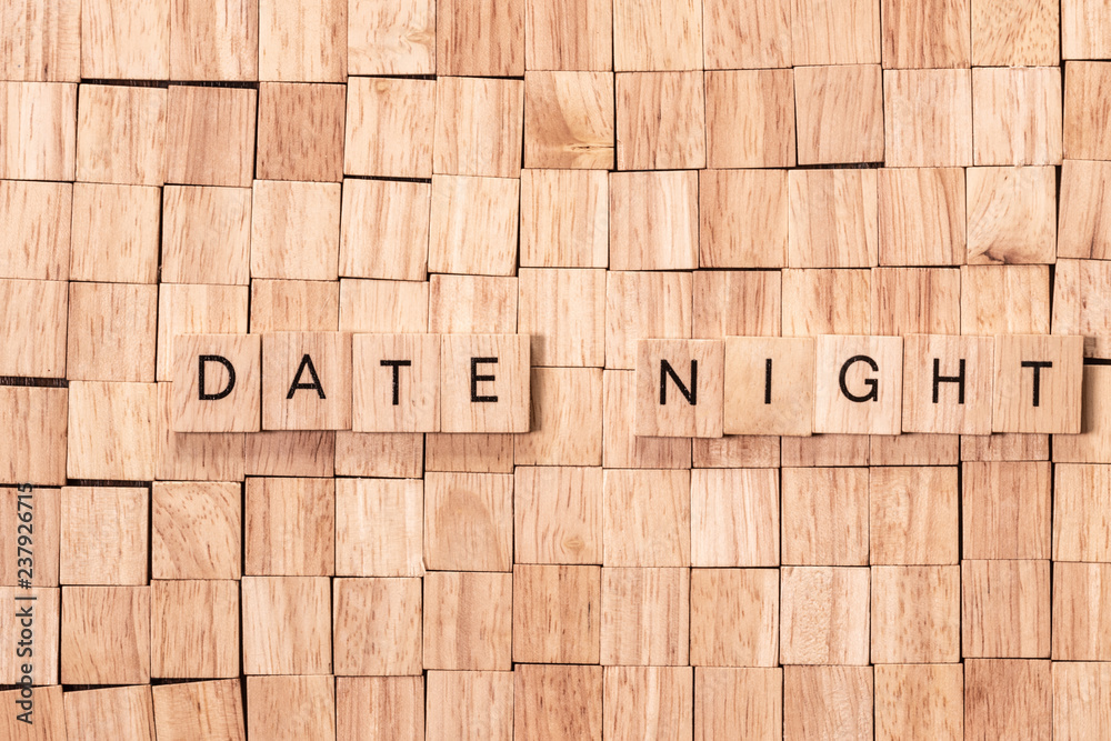 date night spelled out in wooden letters