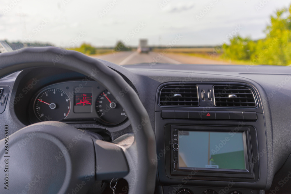 steering wheel, car, road, track, vegetation, inside the car. travel, motor transport.