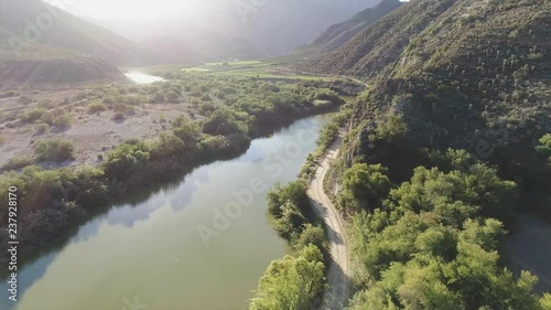 Flying along a river in the Cedaburg Mountains in Africa