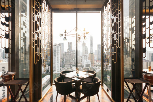 Photography Modern luxury decorated interior restaurant that can view Bangkok cityscape