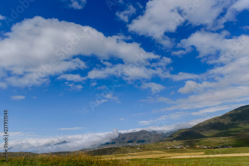 Nature landscape with cumulus clouds