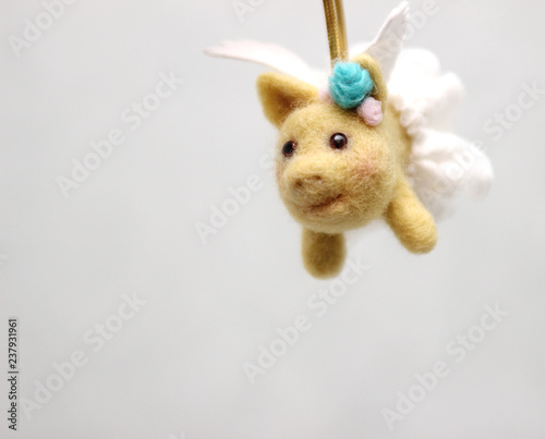 Yellow flying wool pig on tree New year 2019