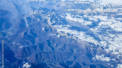 The view from the airplane illuminator on Alps.