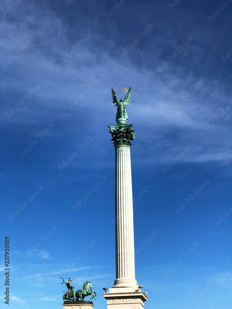 The Archangel Gabriel on a column at the Millennium monument, Budapest, Hungary. The Seven Magyar Chieftains are at the base. Created by Hungarian sculptor György Zala.