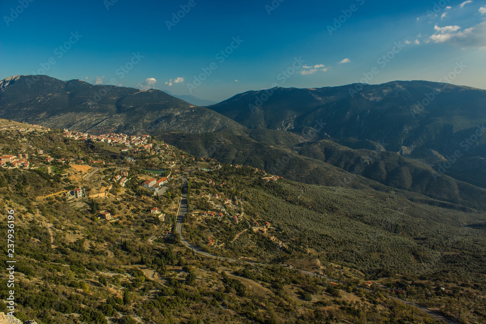 Naklejka premium highland south European village locality place aerial shot from above in mountain nature environment 
